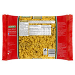San Remo small shell pasta, grocery product, showing close-up of uncooked pasta shells in a bowl.