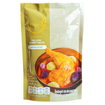 Khao Yellow Curry Paste from Khao grocery brand, showing a jar of vibrant yellow curry paste on a clean surface.