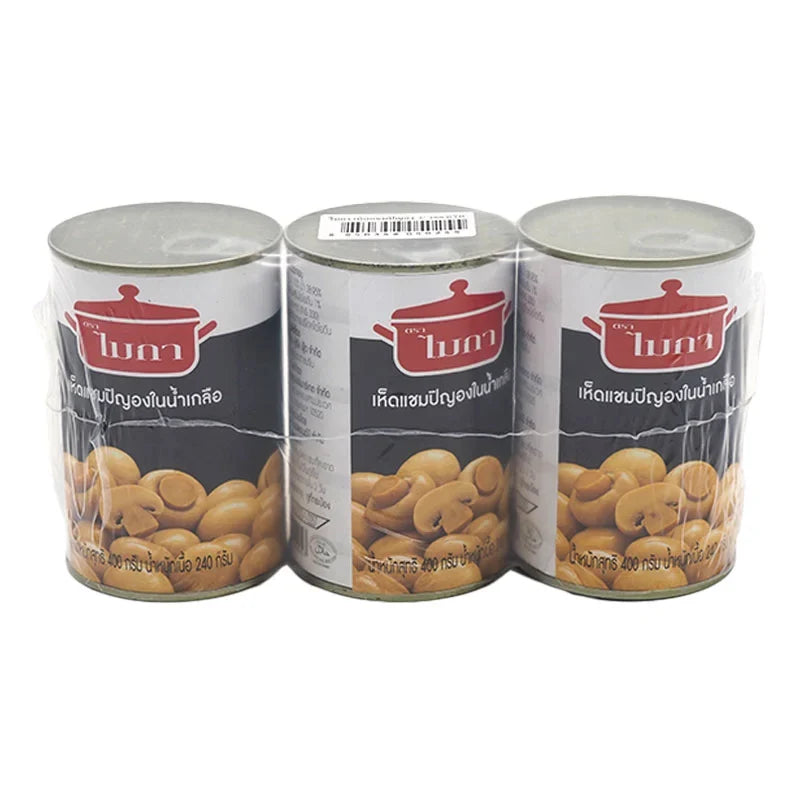 Cans of MICA Whole Champignon Mushrooms in brine, 400g each, stacked in a row, available in a dry grocery setting.