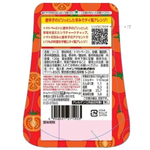 Heinz Sriracha Ketchup sauce bottle with red and green label, sitting on a grocery store shelf.