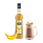Mathieu Teisseire Banana Syrup 700ml bottle, dry grocery product with a yellow label and banana graphic, on a white background.