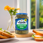 Jar of Vlasic Sandwich Dill Chips with crunchy pickles visible inside, ideal for sandwiches and snacking.