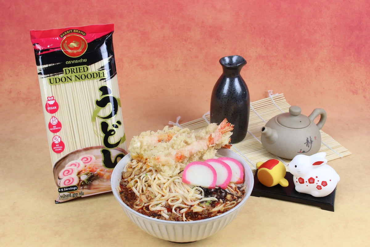 Dry Rabbit Brand Udon Noodles 400g package, showing the sealed noodle bundle in a clear plastic bag.