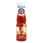 Deksomboon Tomato Sauce 165g jar, showcasing the label and product packaging for dry grocery use.