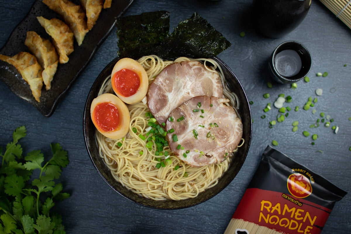 Dried Rabbit Brand Ramen noodles in a clear plastic package, ready for cooking, from the Rabbit Brand dry grocery product line.