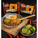 Pack of Domin Mie Fried Instant Noodles Hot Chicken Lemon flavor in a grocery store setting.
