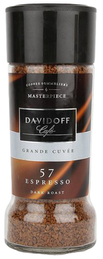 Davidoff Espresso Dark Roast freeze-dried coffee drink in a glass, showcasing rich dark coffee with a frothy top.