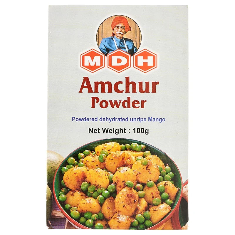 MDH Amchur Powder in a plastic jar, dry grocery spice used for tangy flavoring in Indian cooking