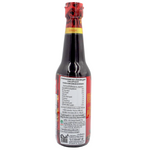 Manggon Somboon Scallop Sauce in a glass bottle, ideal for cooking, with a dark, savory appearance and label visible.