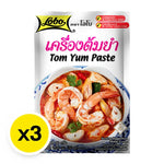 Lobo TOM YUM Paste 30g pack, Thai dry grocery product with vibrant red and green chili ingredients, packed in a clear plastic bag.