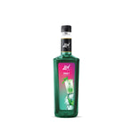 Lin Syrup Mint Flavor in a clear bottle, showcasing the mint-flavored dry grocery syrup with green mint leaves visible inside.