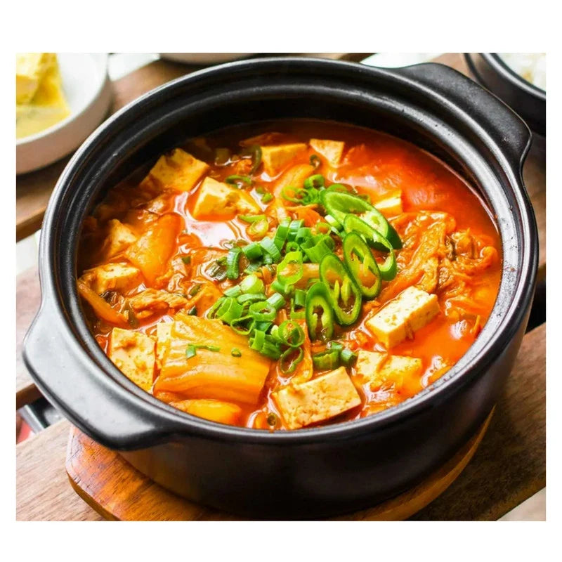 S&B Kimchi Marinade Sauce Mix with red chili pepper, dry grocery product, spicy Korean-style marinade for cooking and flavoring.