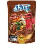 Fathai Hot Pot Instant Concentrated Boat Noodle Soup in a bowl, ready to serve with noodles and broth, typical for Thai cuisine.