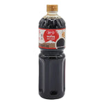 Aro Shoyu soy sauce bottle, 1-liter size, in a clear glass container with a red cap, shown on a plain background.