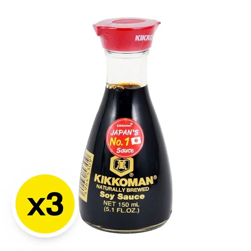 Kikkoman soy sauce bottles, 150ml each, displayed in a pack of three, for use in cooking and seasoning.
