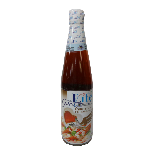 Bottle of Good Life Low Sodium Fish Sauce, a grocery condiment with clear label, sitting on a kitchen countertop.
