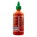 Bottle of Sriracha Hot Chili Sauce from Sriracha brand, showing the bright red sauce in a clear squeeze bottle.