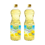 Yok Extra 100% Canola Oil in two 1-liter bottles, ideal for cooking and baking in dry grocery aisle