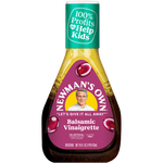 Bottle of Newman's Own Balsamic Vinaigrette dressing for salads and groceries, with label and transparent bottle visible.