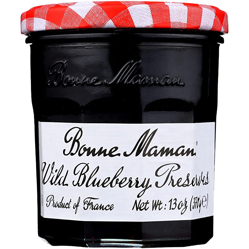 Glass jar of Bonne Maman Wild Blueberry Preserves with a white lid and label featuring blueberries and branding details.