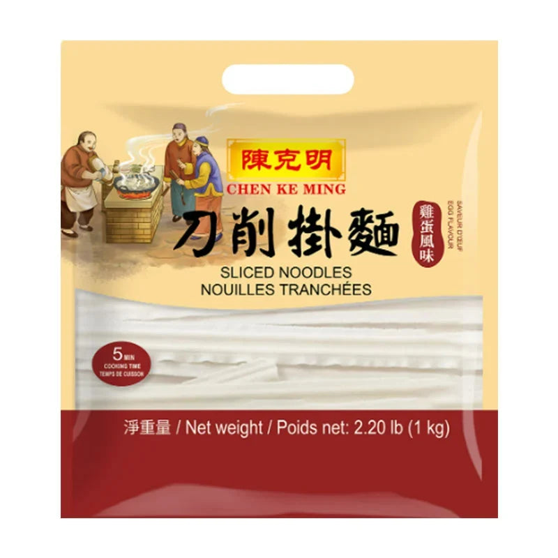 Dry grocery Chen KE Ming sliced egg noodles in 1kg package, showing neatly stacked yellow egg noodle slices in a clear bag.