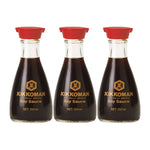 Three bottles of Kikkoman soy sauce in 150ml packaging, ideal for dry grocery shopping, shown in the product image.