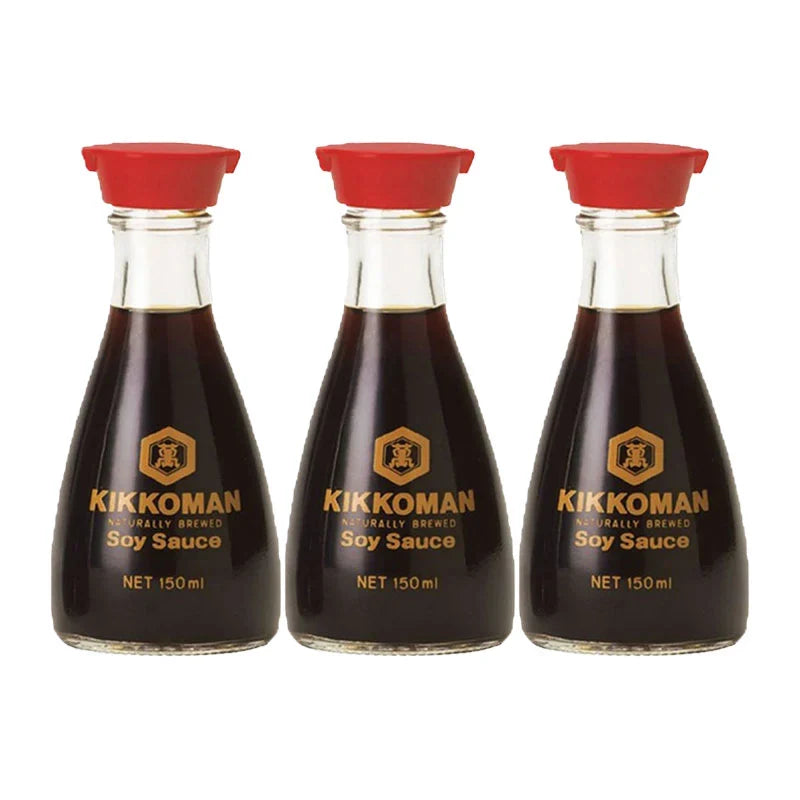 Three bottles of Kikkoman soy sauce in 150ml packaging, ideal for dry grocery shopping, shown in the product image.