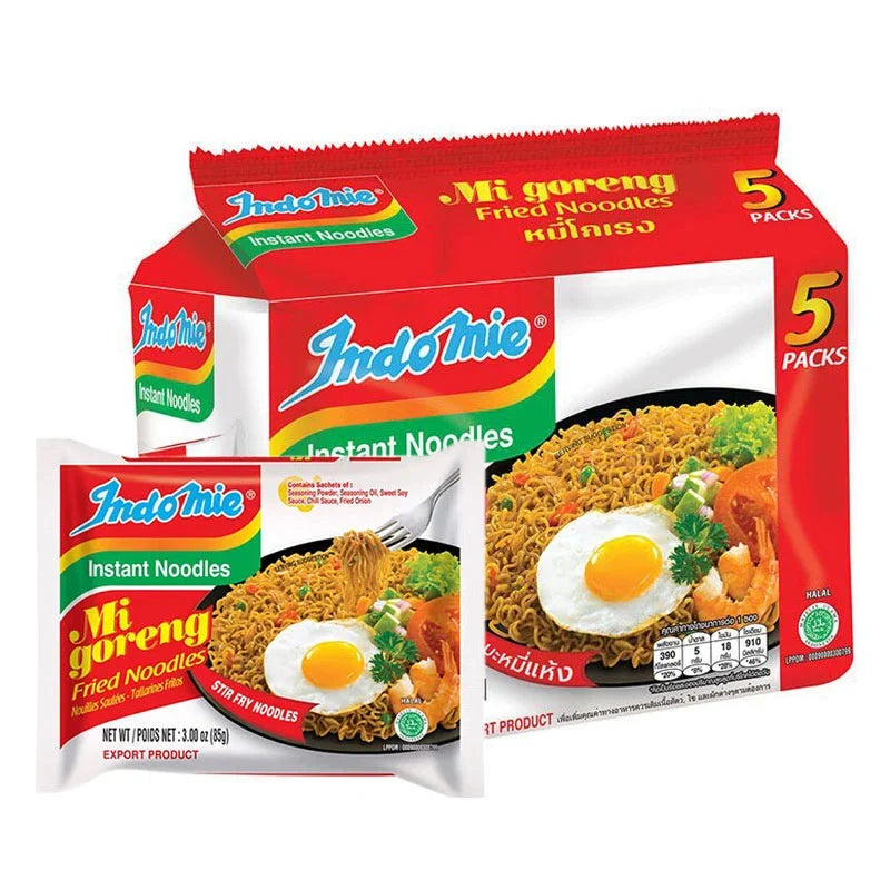 Indo MIE Mi Goreng fried noodles in 85g packs, stacked in a box, featuring the branded packaging and noodle image.