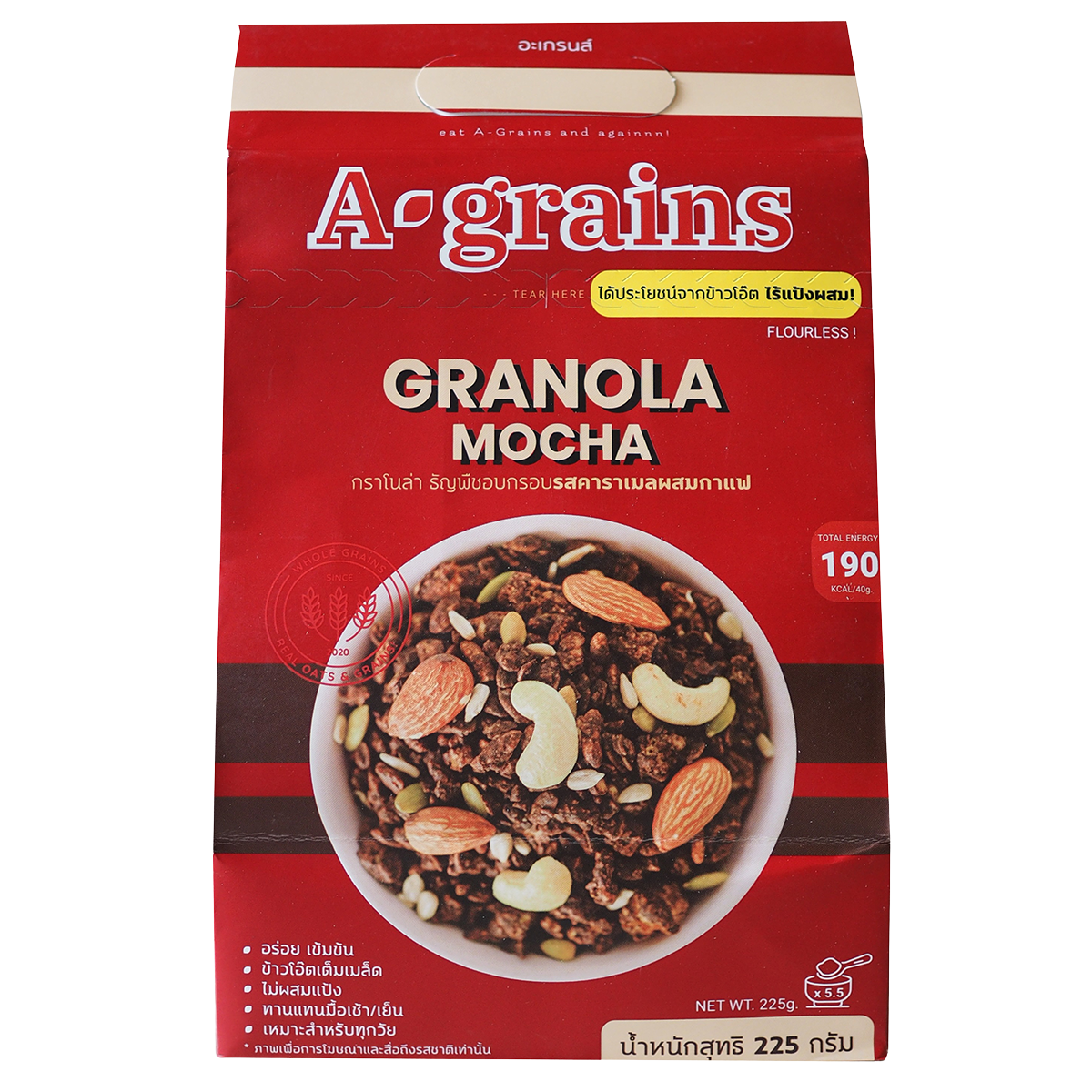 A bowl of A Grains Granola Mocha with visible oats, chocolate chunks, and coffee flavor pieces on a wooden surface.