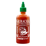 Bottle of Sriracha Hot Chili Sauce from the Sriracha brand, showing the bright red sauce in a clear plastic squeeze bottle.