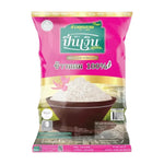 Pin Nguen fragrant rice 100% soft, 5kg bag, dry grocery product showing a close-up of the rice grains in a bag