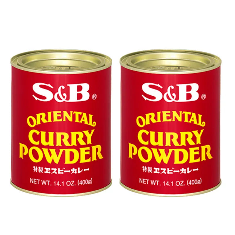 S & B Oriental Curry Powder Mix with turmeric in a dry grocery package, showing the spice blend and vibrant yellow color.