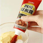 Youki Shisen Tobanjan Sichuan Chili Miso Doubanjiang sauce in a jar, featuring red chili paste with spicy and savory appearance.