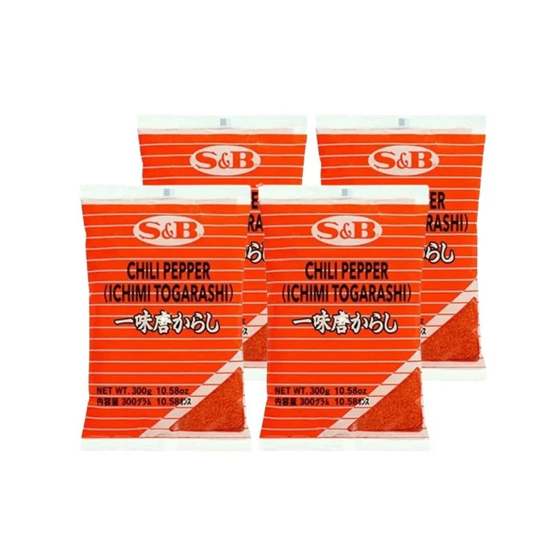 S & B Marco Polo Chili Pepper Ichimi Togarashi in four 300g bags, dry grocery spice with red chili flakes and aromatic seasoning.