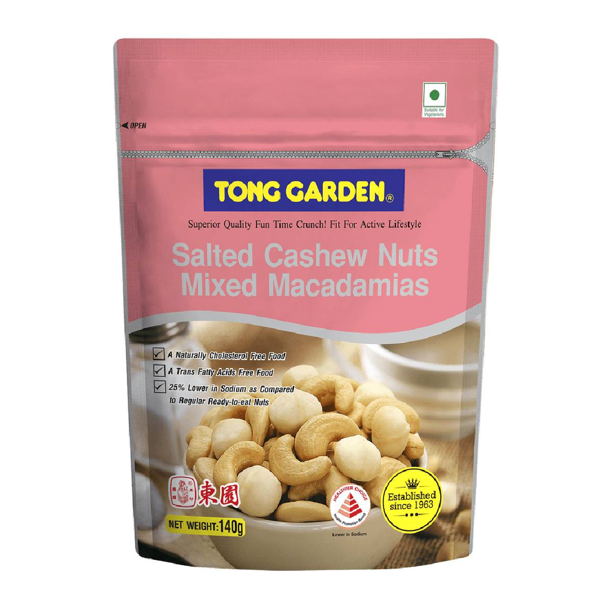 Tong Garden salted cashew and macadamia nuts in a clear bowl, showcasing crunchy confectionery snack pieces.