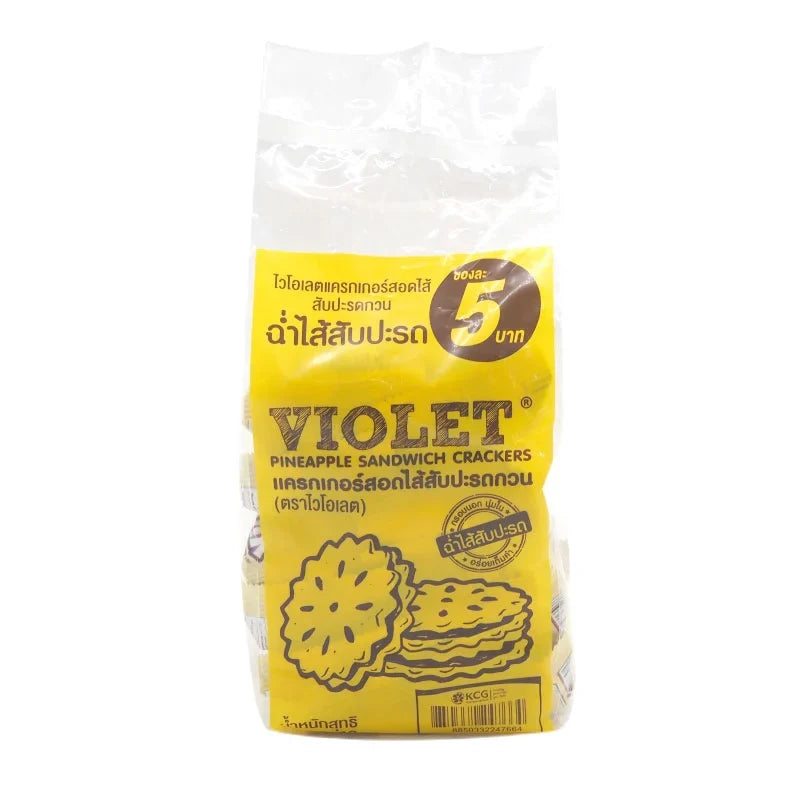 Violet Cracker Pineapple 32, dry grocery snack, featuring pineapple-flavored confectionery crackers in a colorful package.