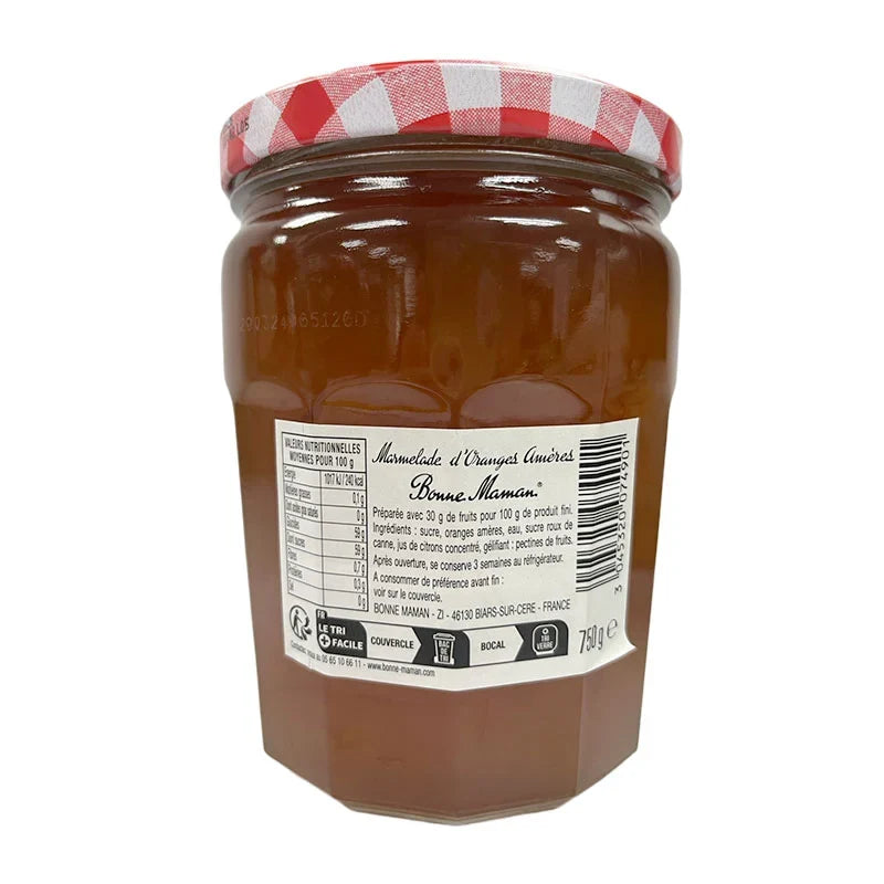 Glass jar of Bonne Maman orange marmalade with orange slices, 750g, on a white background, showcasing the product's label and contents.