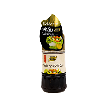Pure Foods Japanese soy sauce dressing bottle on a grocery store shelf, highlighting the product label and packaging.