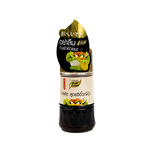 Pure Foods Japanese soy sauce dressing bottle on a grocery store shelf, highlighting the product label and packaging.
