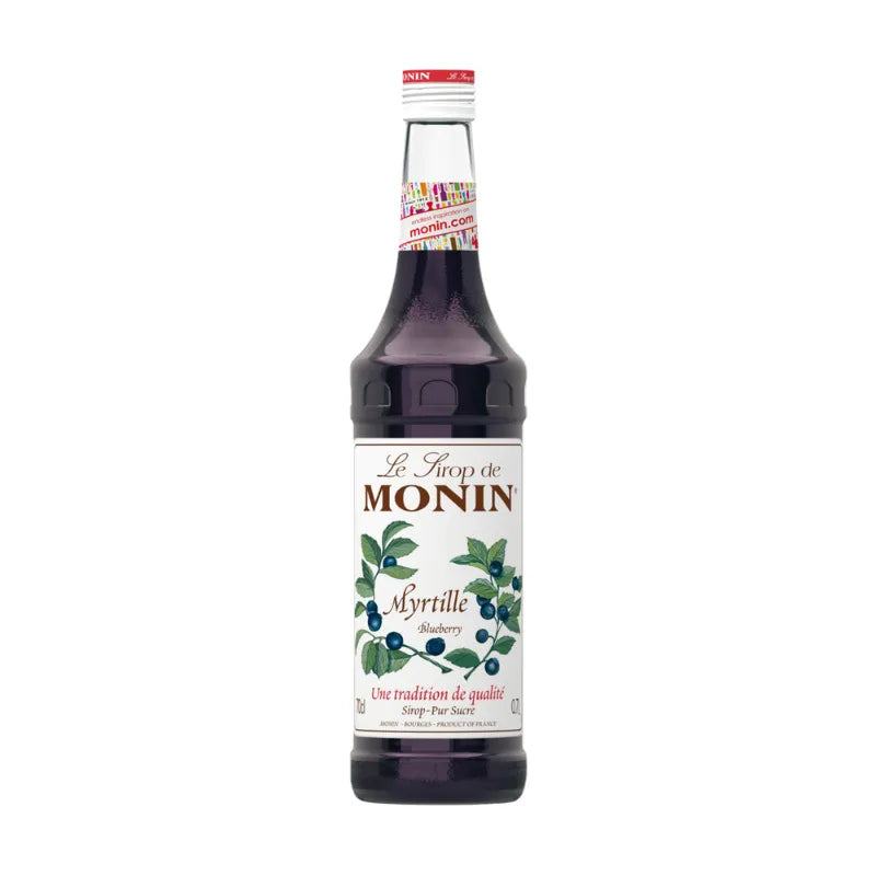 Monin Butterfly Pea Syrup 700ml bottle, a colorful dry grocery product with a vibrant blue liquid in a clear plastic bottle.