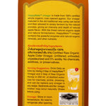 Bottle of Happy Mate Organic Apple Cider Vinegar with label showing health benefits and natural ingredients.