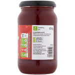 Sainsbury's strawberry jam jar with red fruit spread visible, labeled as grocery product, on a white background.