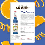 Bottle of MONIN Blue Curacao Syrup 700ml for cocktails and drinks, featuring a bright blue liquid in a clear plastic bottle.