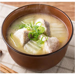 Marukome Ryotei No Aji Shiro Miso white soybean miso paste in a jar, traditional Japanese dry grocery product.
