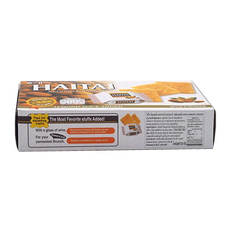 Haitai almond-flavored crackers in a 133g package, crispy snack from Haitai's dry grocery confectionery collection.