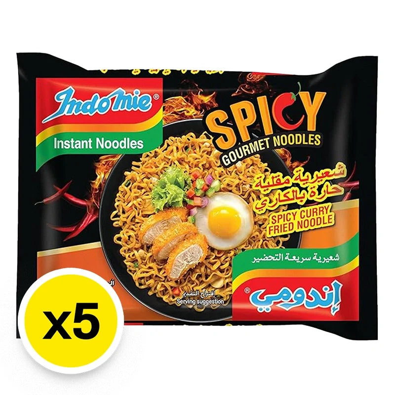 Indo Mie Mi Goreng Spicy Chicken instant noodles in a 83g pack, shown in a colorful dry grocery product image