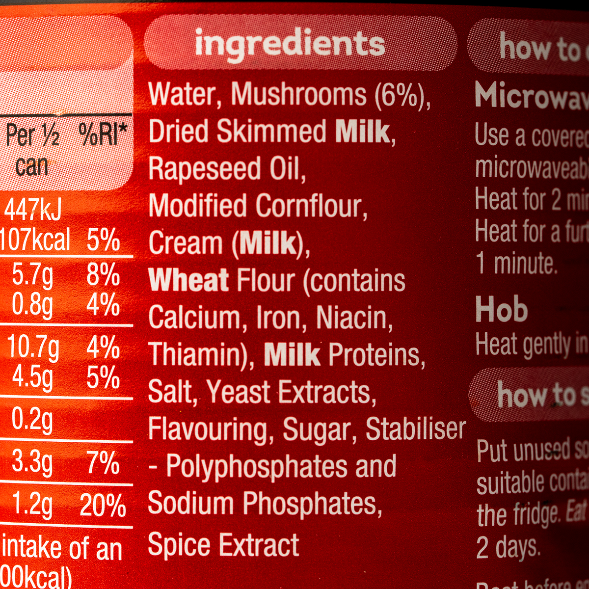 Heinz Cream of Mushroom Soup in a can, showing the label with mushroom images and product name, ready for cooking or serving.