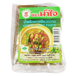 Namjai Green Curry Paste 50g pack, dry grocery product with vibrant green Thai curry ingredients in colorful packaging.