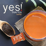 YES Thai Tea Flavored Candy, 12 packs of confectionery snacks with vibrant packaging and Thai tea branding.