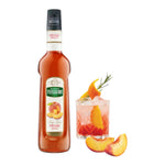 Mathieu Teisseire Peach Syrup bottle, 700ml, in a clear plastic container with a colorful label, used for flavoring beverages and desserts.